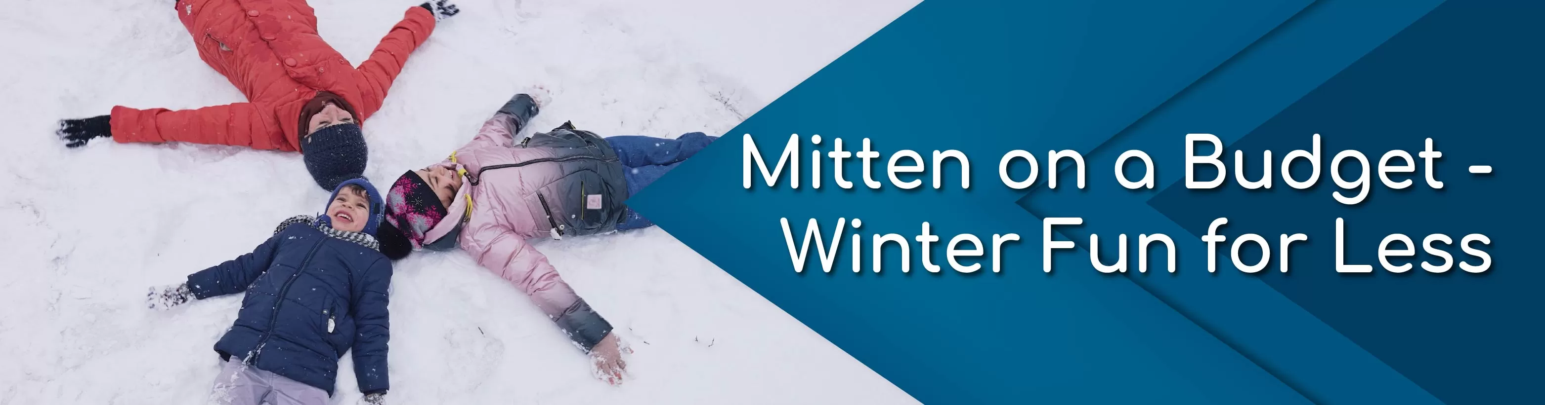 Family playing in snow and making snow angels